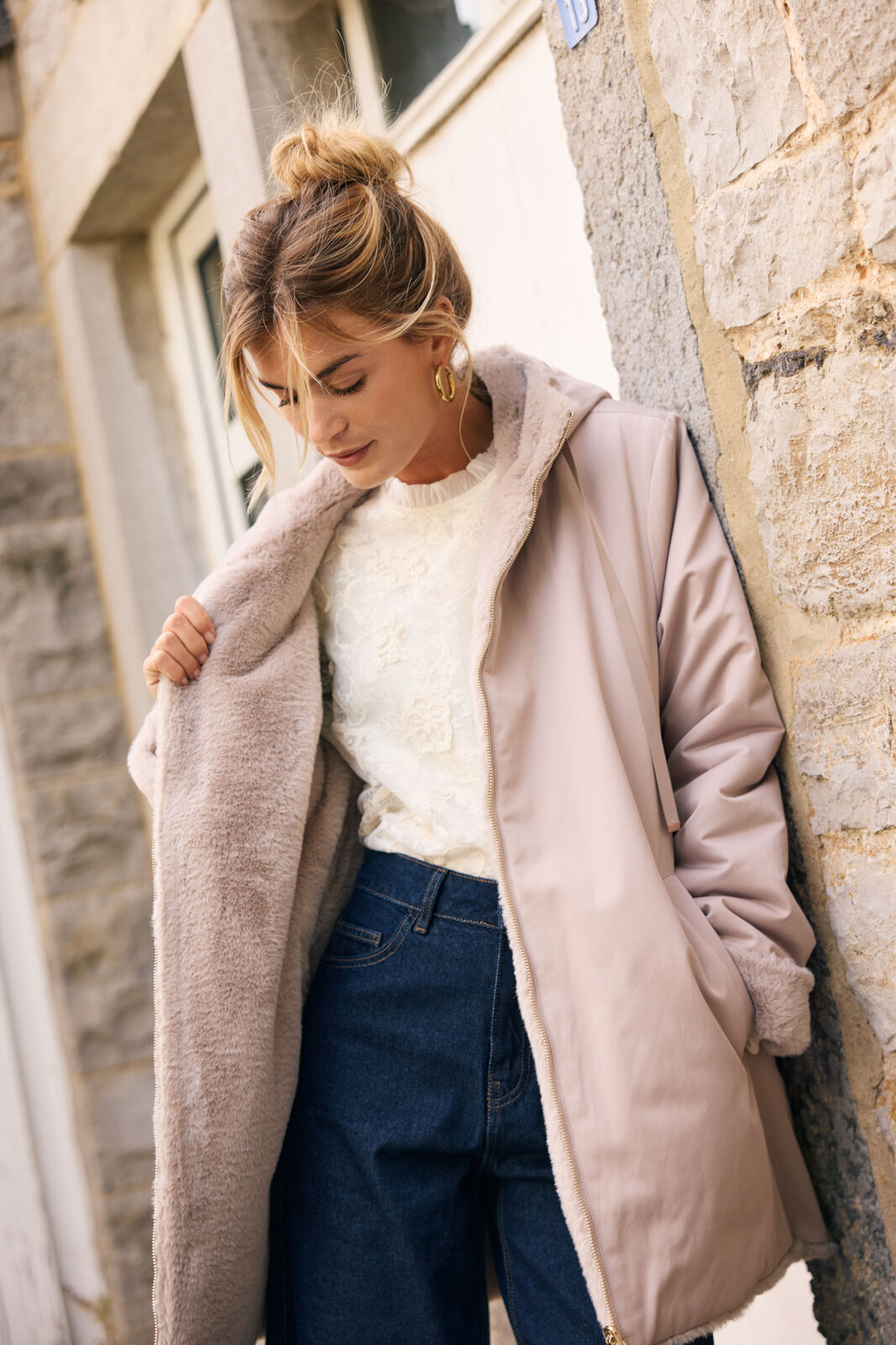 Model wearing a long coat